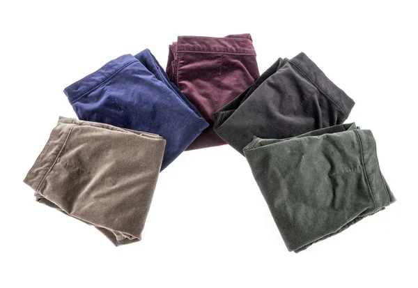 Velours broek van geassorteerde kleuren geïsoleerd op wit — Stockfoto