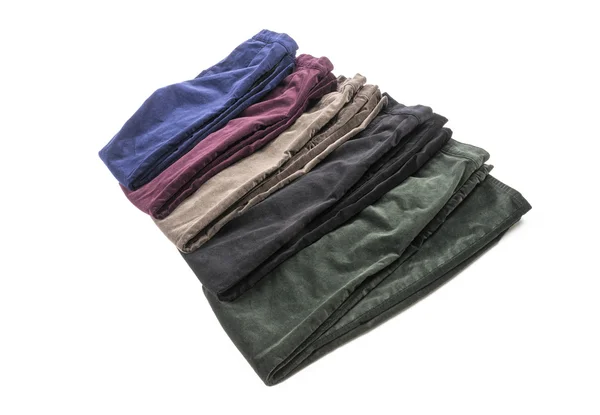 Pantalon en velours de couleurs assorties isolé sur blanc — Photo