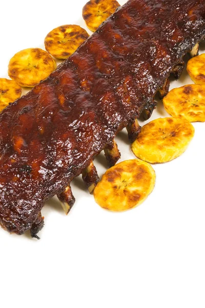 Barbecued Pork Baby Back Rib and Fried Plantains — Stock Photo, Image