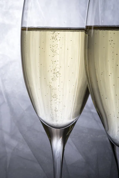 Closeup of Two Glasses of Champagne on Grey Background — Stock Photo, Image