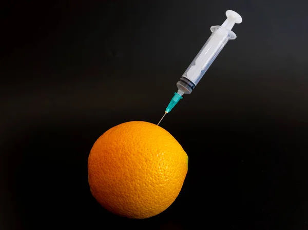 Шприц Погруженный Апельсин — стоковое фото
