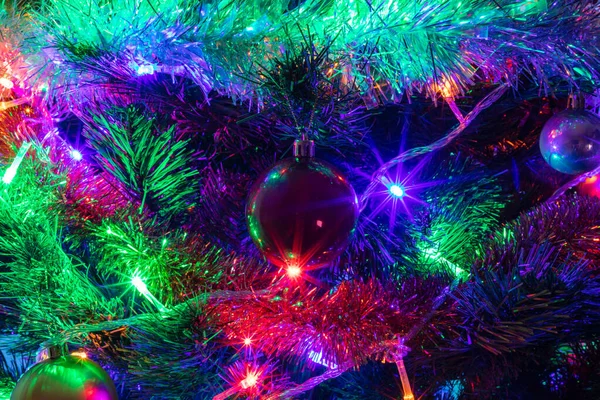 Decorated Christmas Tree Closeup Shot Red Golden Balls Illuminated Garland — Stock Photo, Image