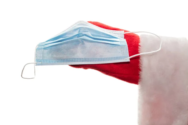 Nahaufnahme Der Hand Des Weihnachtsmannes Mit Einer Medizinischen Maske Neues — Stockfoto