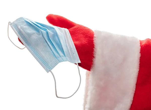 Nahaufnahme Der Hand Des Weihnachtsmannes Mit Einer Medizinischen Maske Neues — Stockfoto