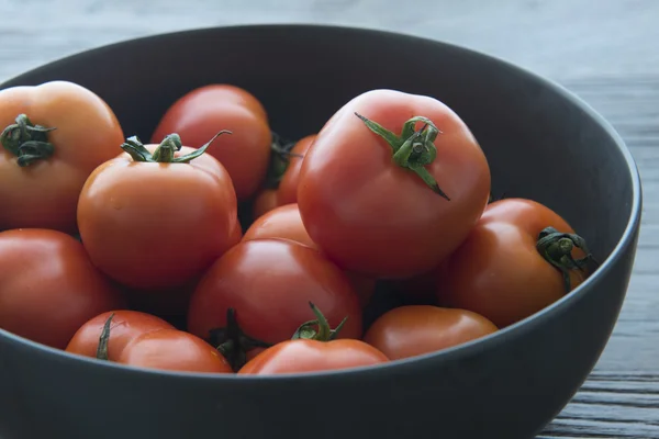 The pot of fresh tomatoes — Stock Photo, Image