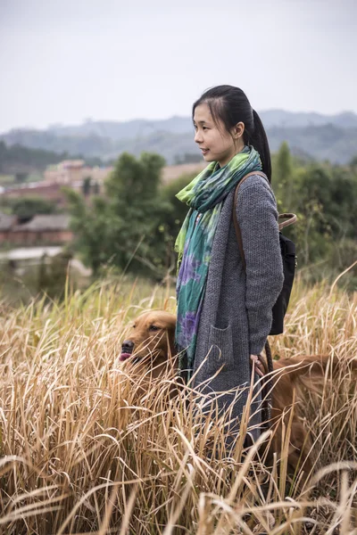 Girl and her dog — Stock Photo, Image