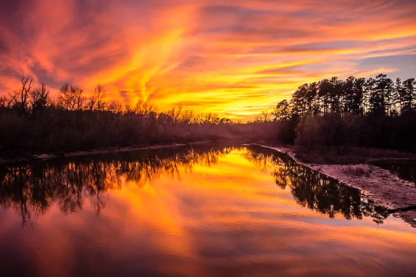 Orange sunset over lake — Stock Photo, Image