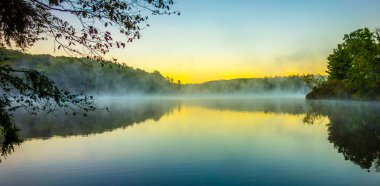 Grandfather Mountain Sunrise Reflections on Julian Price Lake in clipart