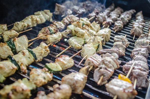 Shishkabob being grilled on a grille — Stock Photo, Image