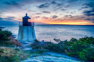 Castle Hill Lighthous 'da günbatımı. Newport, Rhode Island