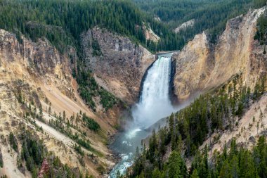 upper falls in yellowstone national park wyoming clipart