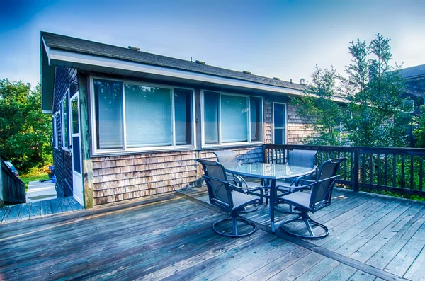 Strand huis veranda bij zonsopgang — Stockfoto