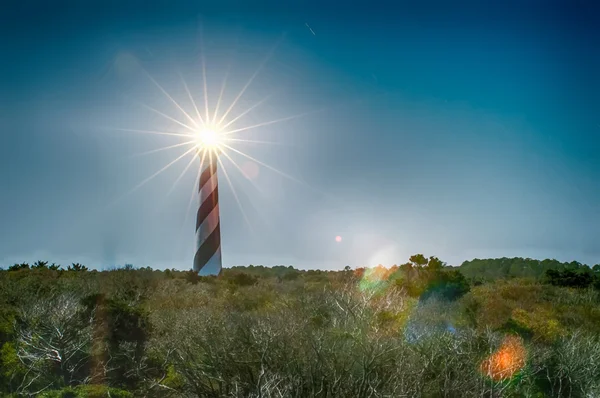 Histórico do cabo hatteras farol iluminado à noite — Fotografia de Stock