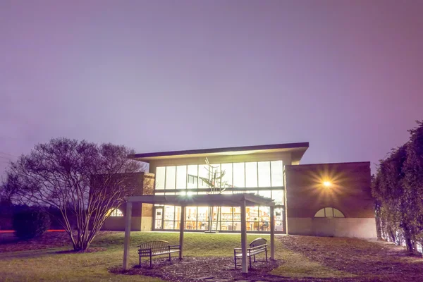 Modern view of public library at night — Stock Photo, Image