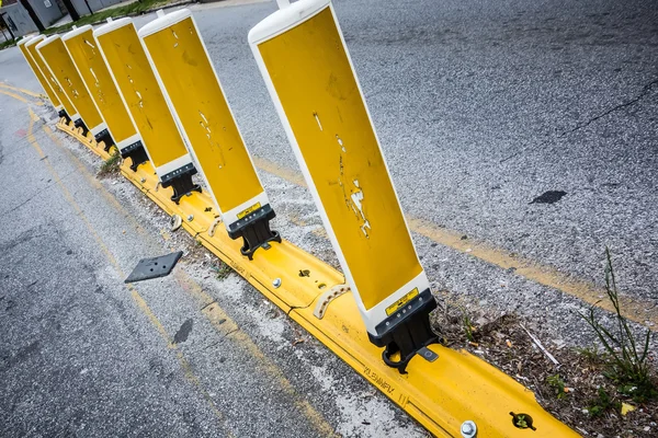 Yellow reflective cones set up to direct traffic — Stock Photo, Image