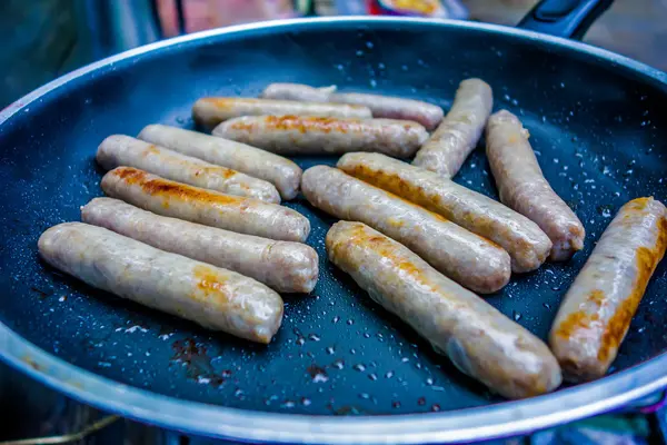 Cooking breakfast on a camping stove — Stock Photo, Image