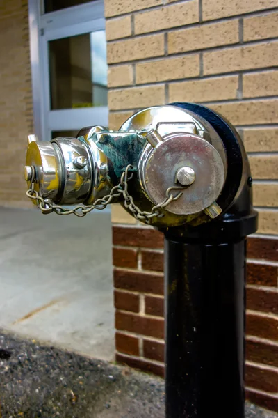 Standpipe with siamese connection device for fire hoses — Stock Photo, Image