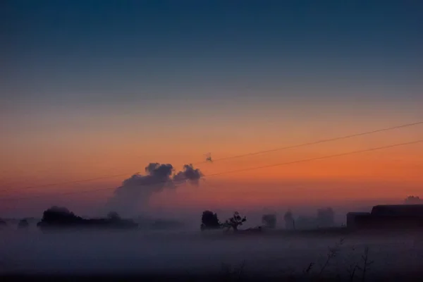 Early sunrise over foggy farm landscape in rock hill south carol — Stock Photo, Image