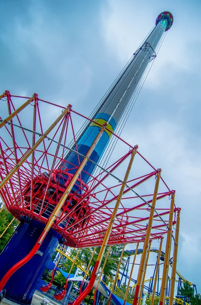 Crazy rollercoaster rides at amusement park — Stock Photo, Image