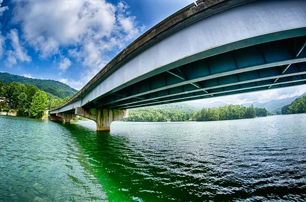 Overpass freeway  bridge spans across a lake — Stock Photo, Image