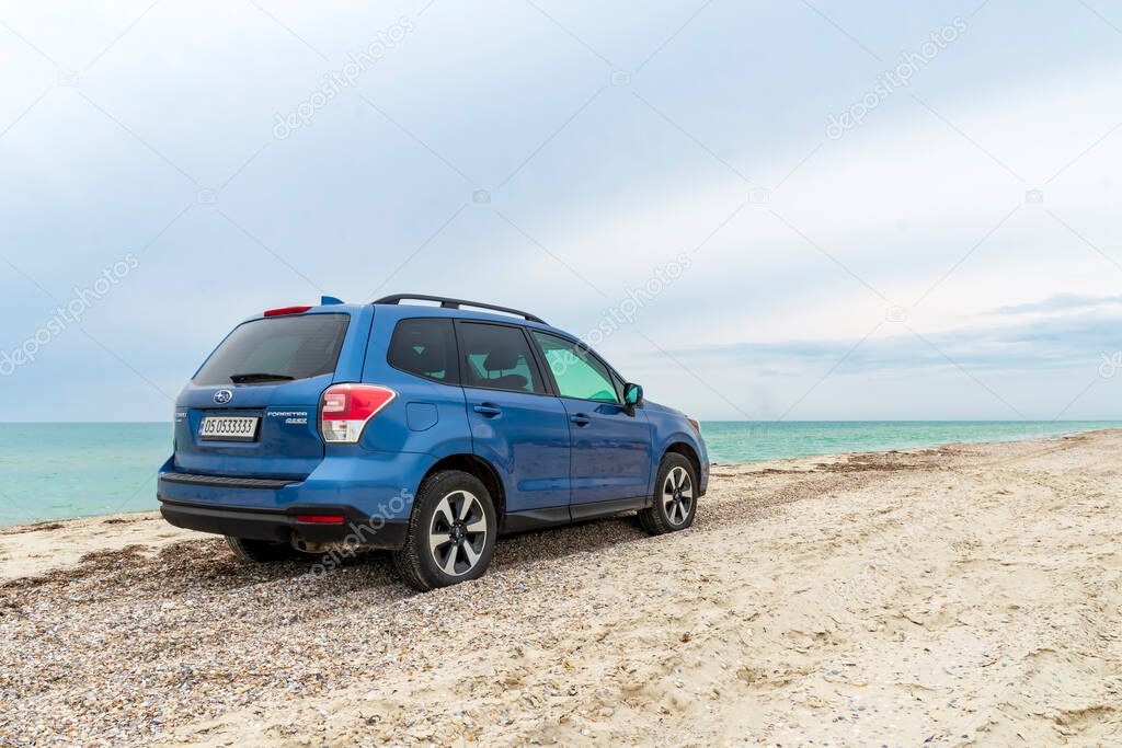 Lazurne, Ukraine - May 31, 2021: Subaru Forester at sand beach