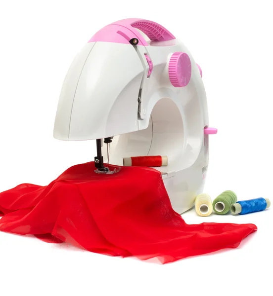 Máquina de coser para niños con tejido rojo — Foto de Stock