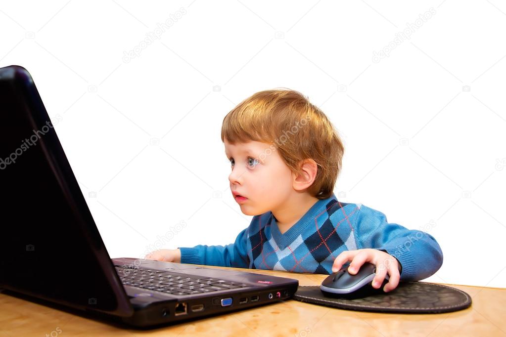 Cute three years boy with laptop isolated on white background