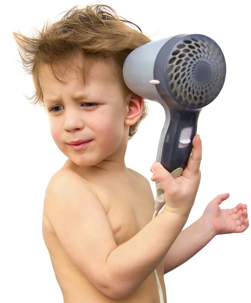 Baby boy with hair dryer over white — Stock Photo, Image