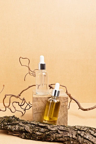 Clear Amber Serums Glass Bottles Wooden Nature Elements Sand Beige — Stock Photo, Image