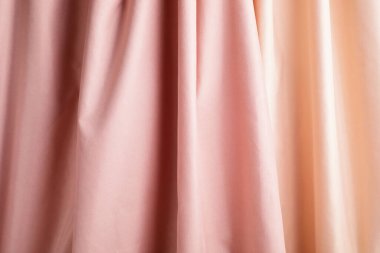 Pembe ve bej kumaş arka plan. Soyut zemin, lüks kumaş.