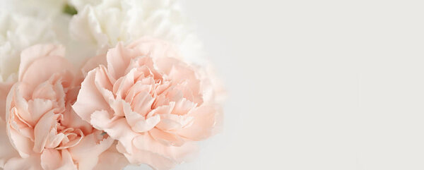 Spring flower bouquet over light background with copy space. Bridal bouquet, mothers day gift, online blog header, website banner