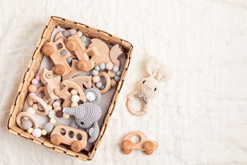 Eco fiendly child wooden toys. Sustainable, developmental, sensory toys for babies and toddlers. Top view, flat lay