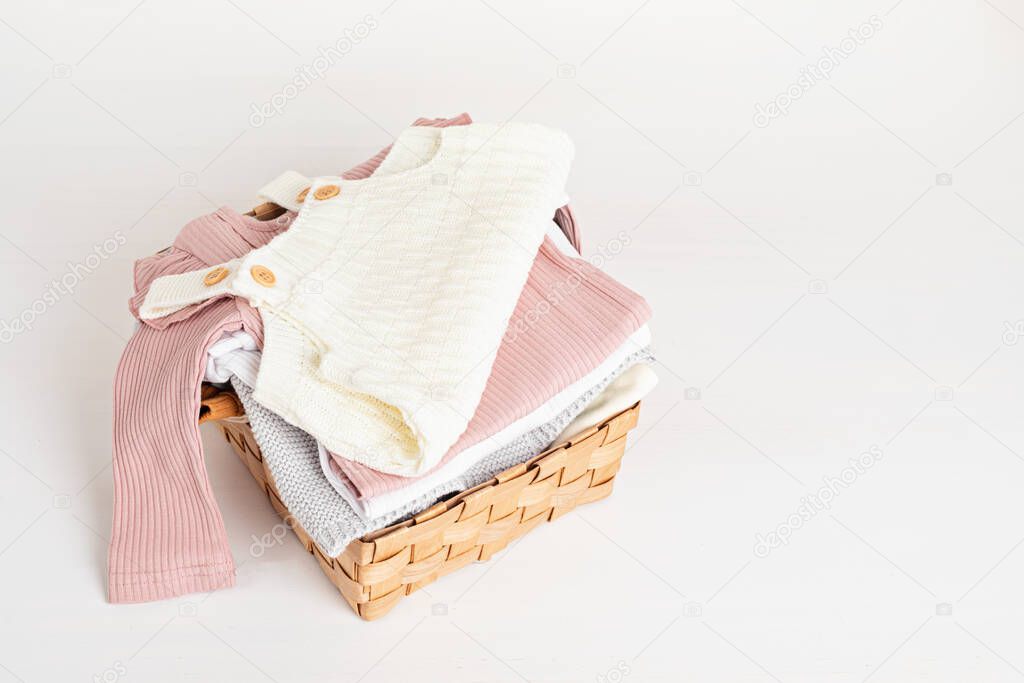 Baby and child clothes in the box. Second hand apparel idea. Circular fashion, donation, eco friendly sustainable lifestyle, thrifting shop concept.