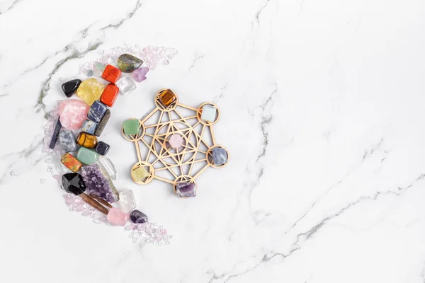 Healing chakra crystal grid therapy. Rituals with gemstones and aromatherapy for wellness, healing, meditation, destress, relaxation, mental health, spiritual practices. Energetical power concept