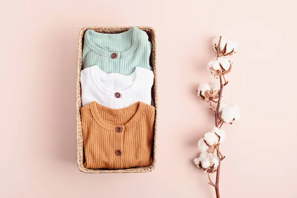 Gender neutral baby garment. Organic cotton clothes, newborn fashion — Stock Photo, Image
