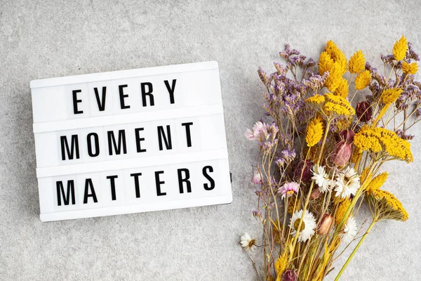 Lightbox with text every moment matters. Mental health, positive thinking idea — Stock Photo, Image
