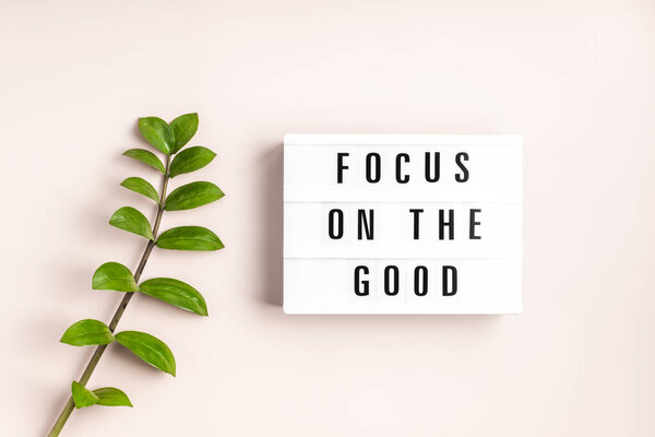 Lightbox with text focus on the good. Mental health, positive thinking idea