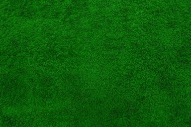 Terry havlu dokusu. Yumuşak kumaş arka plan. Yeşil havlu.