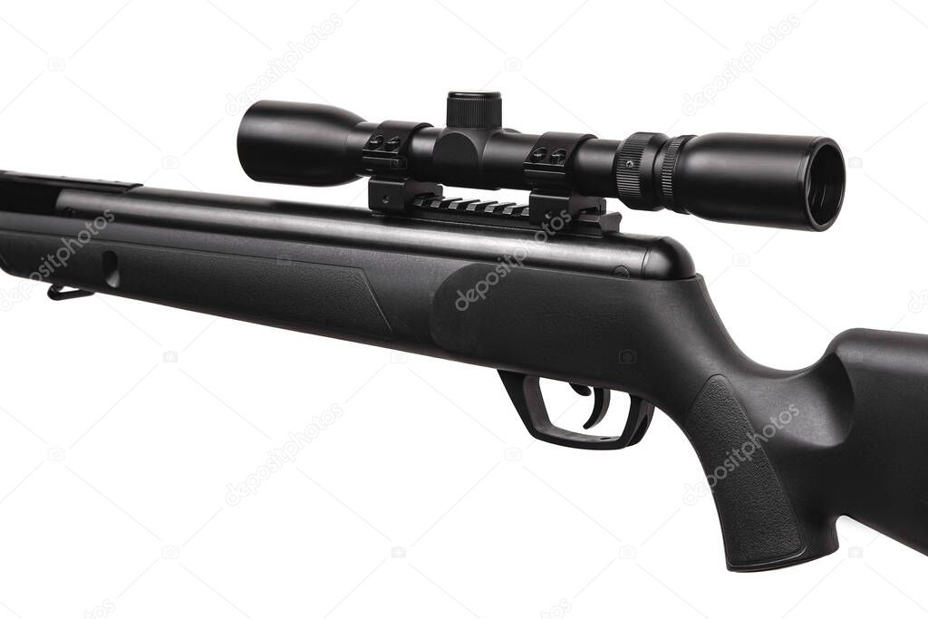 Black pneumatic rifle with an optical sight isolated on white background.