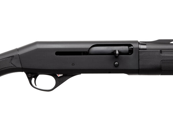Close-up of the receiver and trigger mechanism of a black semi-automatic shotgun on white.