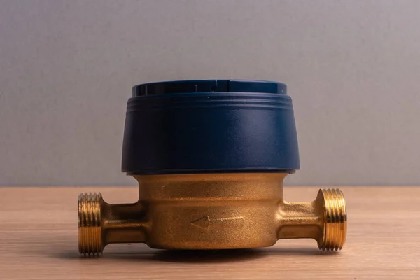 Household flow meter for cold water, blue, complete with connecting fittings and gaskets.