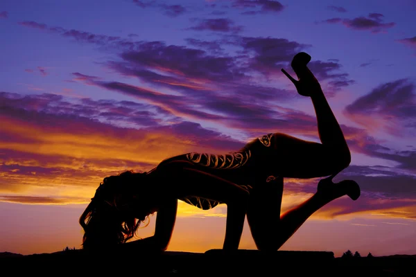 Silhouette of skeleton woman knee down head down — Stock Photo, Image