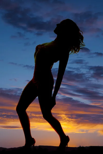 Silhouette woman in pink swimsuit arch back look forward — Stock Photo, Image