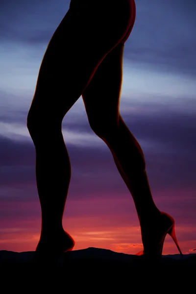 Silhouette of woman legs — Stock Photo, Image