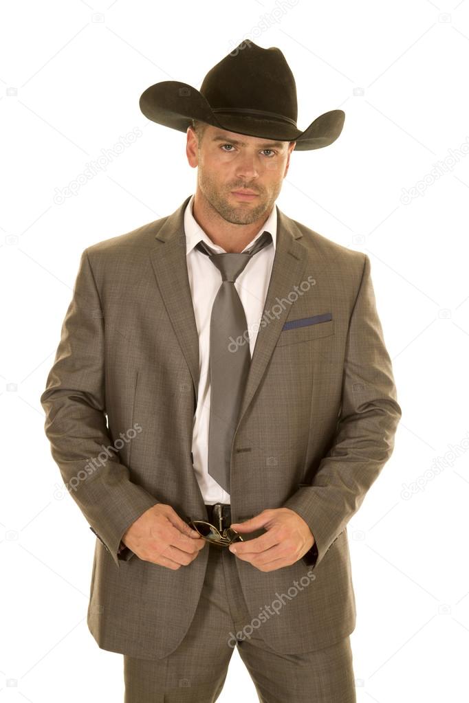 cowboy standing with glasses in his hands