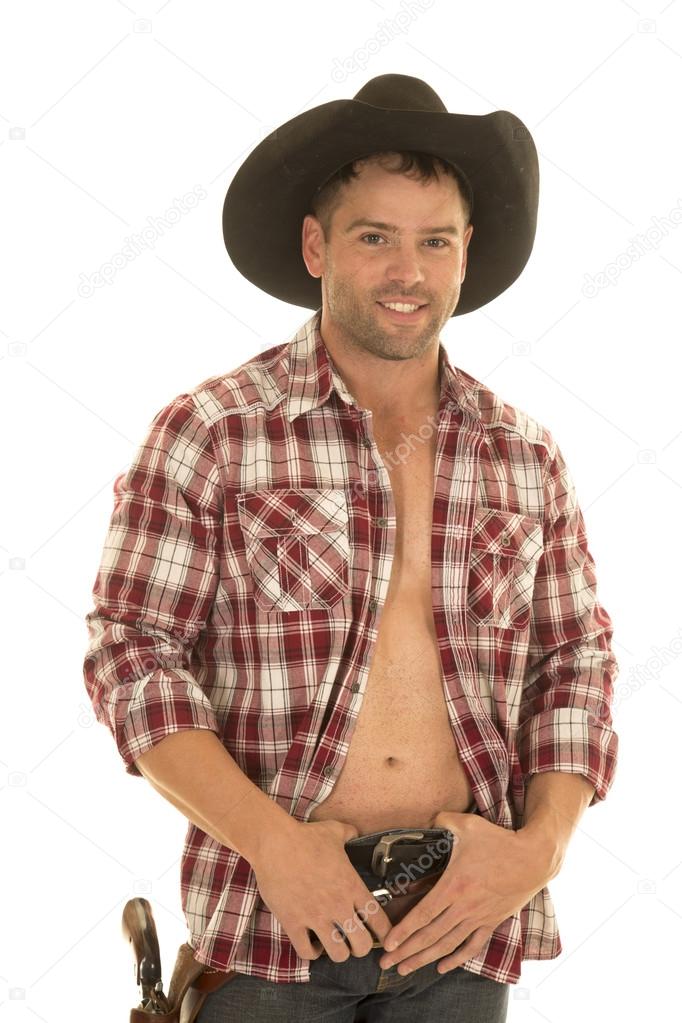 cowboy open plaid shirt hands in belt