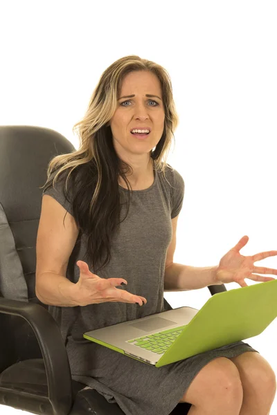 Woman in dress sit with laptop frustrated — Stock Photo, Image