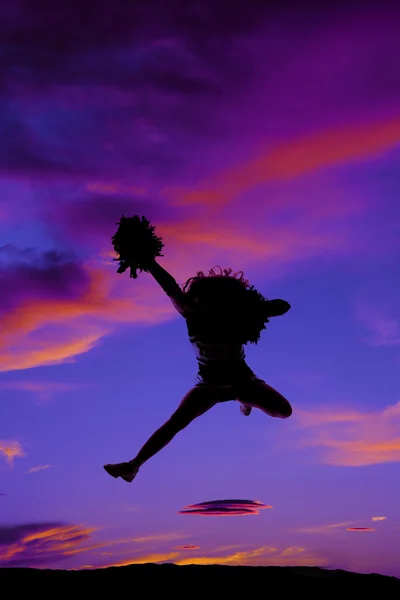 Silueta de animadora saltando — Foto de Stock