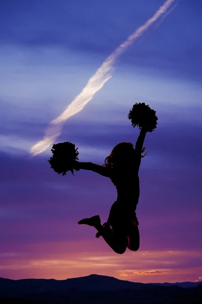 Silhouette of cheerleader jumping in the sky — Stock Photo, Image