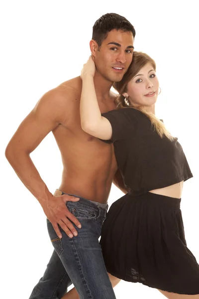 Vrouw zwarte rok man geen shirt nauwe glimlach — Stockfoto